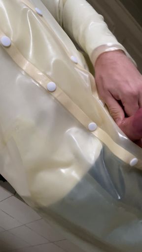 Putting a Condom on in Transparent Latex Raincoat