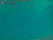 Underwater swimming with jockstrap in hotel pool