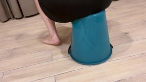 I’m crushing a plastic bucket with my big butt + I freeze the bucket so it crunches.