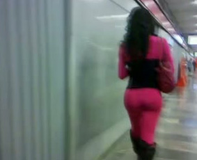 Bootyful shemale babe in pink pants walking in public