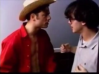 Dan Kelly cruises Cowboy Jim Buck at the porno theater