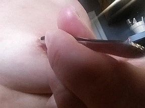 Close up of my huge XXL nipple piercing tunnels