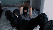 Feet bound tight beneath rough military boots