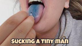 Giantess Sucking Blue Lollipop Before Devouring Tiny Man – Tongue Turns Blue from Candy Lick, Vore Mouthplay, Alternating Sucks & Licks on Her Little Toy with Stained Tongue!