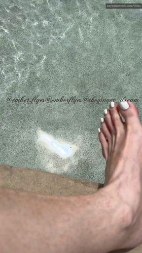 Sundress with feet and legs , feet in the pool