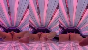 tattooed girl masturbate in the solarium