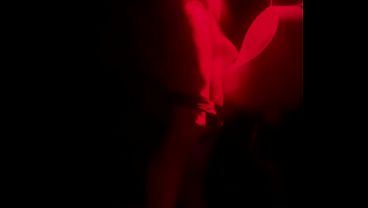 Amateur boy lending hand to his friend pissing in public toilets'_ urinal