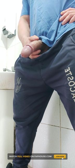 A Well-endowed Brazilian Man Urinating and Showing His Thick Penis to His Female Friends.