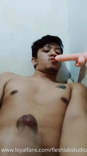 Tatted Pinoy Twink Deepthroats Dildo and Unloads Hard at Home