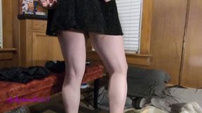 Daphne in her dressing room changing skirts