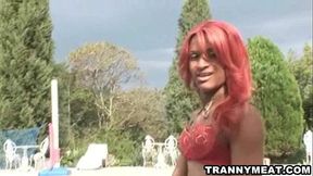 Hot latina redhead tranny jerks her cock off