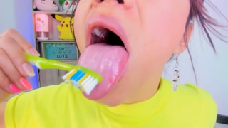Lila Jordan brushes her tongue