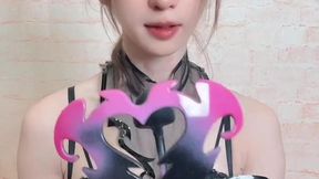 Abby Kitty plays with her devilish charm in chastity belt