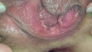 Horny mom plays with, fists, and gapes her soaking wet pussy