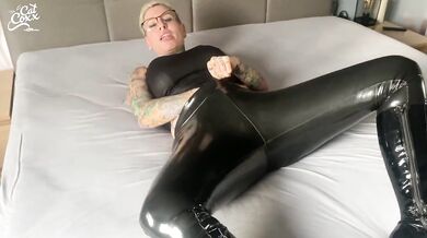 Your dirty latex bitch moans with wet pussy while fucking herself