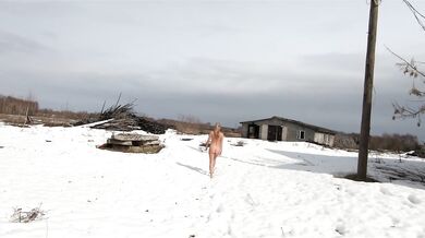 Russian beauty walks naked through the spring village exhibition