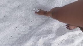 Ebony goddess’s French pedicure in the sand at the beach