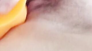 Close up MILF pounded by big orange penis sex toy