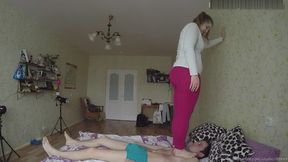 Barefoot Trampling Full Weight On Bed Slave