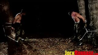 Captive soldier Duke Rivers and Tyler Saint in a rough tormenting play