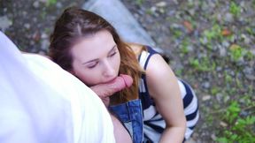 Playful blowjob outdoor