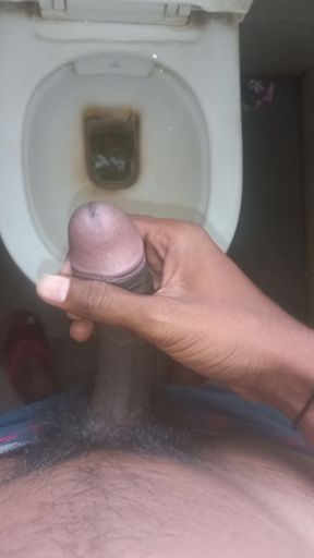 Indian boy jerking off his cock in bathroom