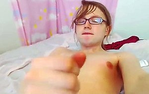 Sadie playing on bed