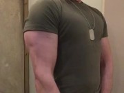 Muscular army guy flexing big biceps and shooting cum, ready to fight!
