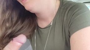 Brunette MILF sucks and strokes his big cock in public
