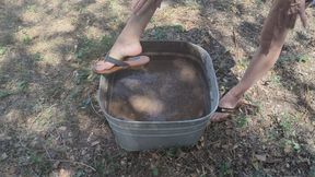 Fifi loses a pair of fancy italian flip flops in her thick mud bin