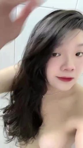 Teen asian babe shows off her nude ass