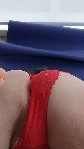 Crossdresser Tries New Positions for Dildo Inserts