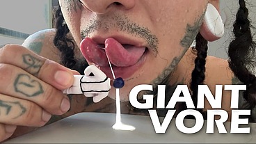 Giant plays with tiny human, lets him smell it and devours him after spilling his milk on his face