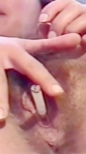 My beautiful stepmother is smoking through her pussy and smiling as she looks at my rock-hard cock.   Clip 1