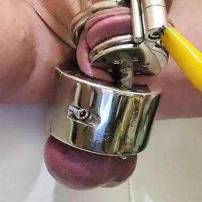 Humiliating cum with chastity and stretched balls