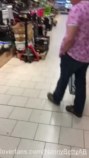 Made to walk in the supermarket in a pink adultbaby dress.