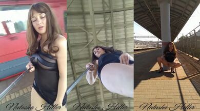 A beautiful, young exhibitionist girl in a transparent dress shows her pussy at the railway station.