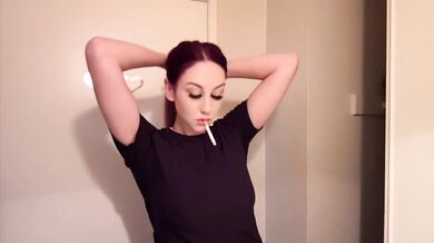 Italian milf smokes with her natural jugs overflowing