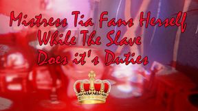 MISTRESS TIA FANS HERSELF WHILE sLAVE DOES ITS DUTIES!
