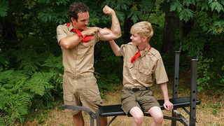 Scout Master Colton McKeon welcomes new scout boy Drew to camp