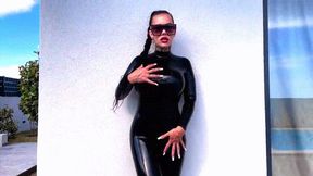 Pee with latex catsuit