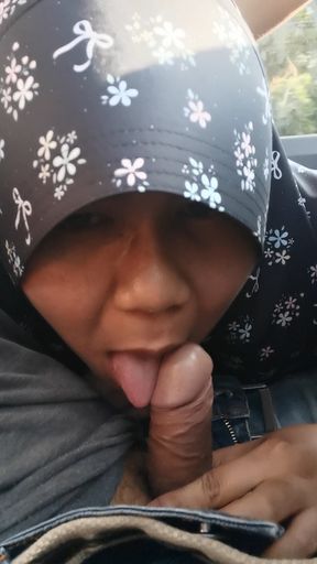 Teacher sucks a man&#039;s cock while driving