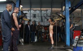 Chained male slave is waiting for his anal punishment