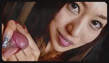 An Yabuki on her knees to give him an asian blowjob