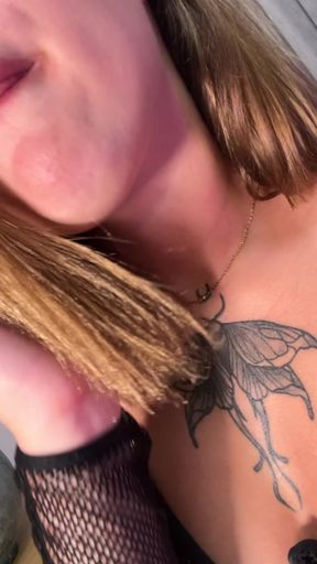 Long-tongued cutie shows off her boobs at home