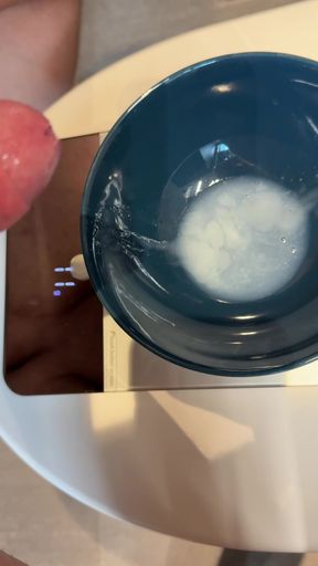 Huge cumshot in a bowl