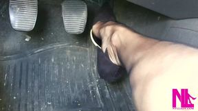 Sensual Driving in Black Suede Pumps with Thin Metal High Heels