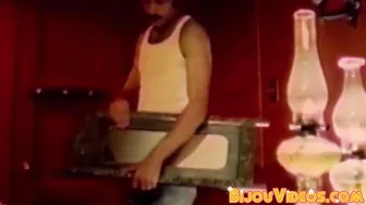 Lean mustached Anthony Lee gets barebacked and sucks cock in vintage scene