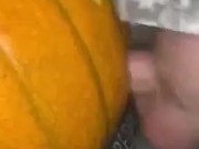 Chubby bear breeding a pumpkin with his throbbing uncut cock