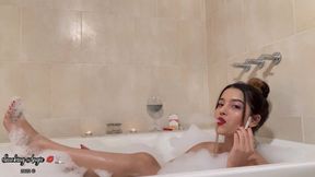 Relaxing bathtub smoking Marlboro red and drinking wine